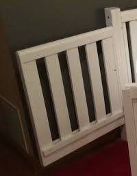 old crib door for DIY dog kennel in garage doors
